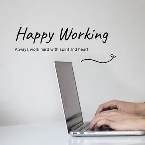 An employee working on laptop in office. Image is displaying Happy Working